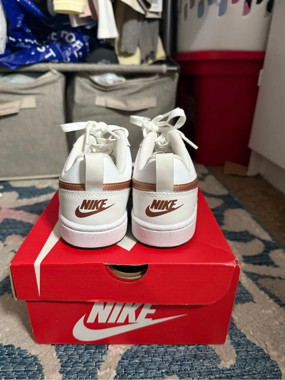 Nike Kids White Sneakers with Metallic Rose Swoosh